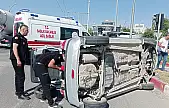 Yan yatan otomobilden sürücü yara almadan kurtuldu
