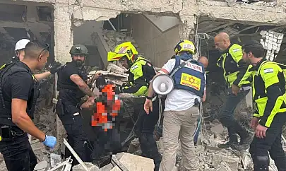 İran'ın işgale yönelik son füze dalgasında 26 kişi yaralandı, ağır hasar oluştu