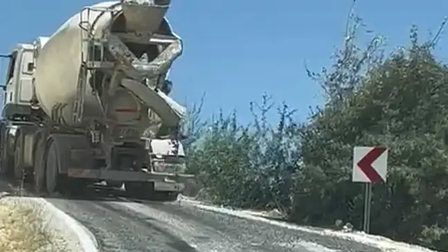 Hekimhan'da beton mikserinin yola beton dökmesi tepki çekti